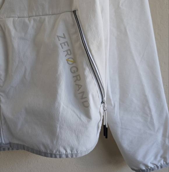 ZERØGRAND Cole Haan White Packable Running Jacket Windbreaker Size L - Picture 2 of 12